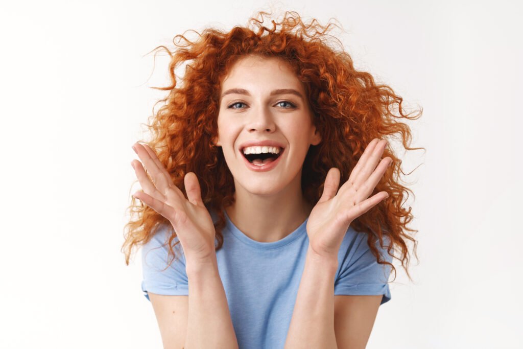 Aries Woman traits shown through confident body language and expressive personality