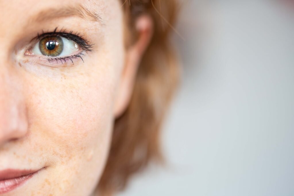 Close-up of a woman’s face with a reflective expression capturing the emotion behind a love quotes
