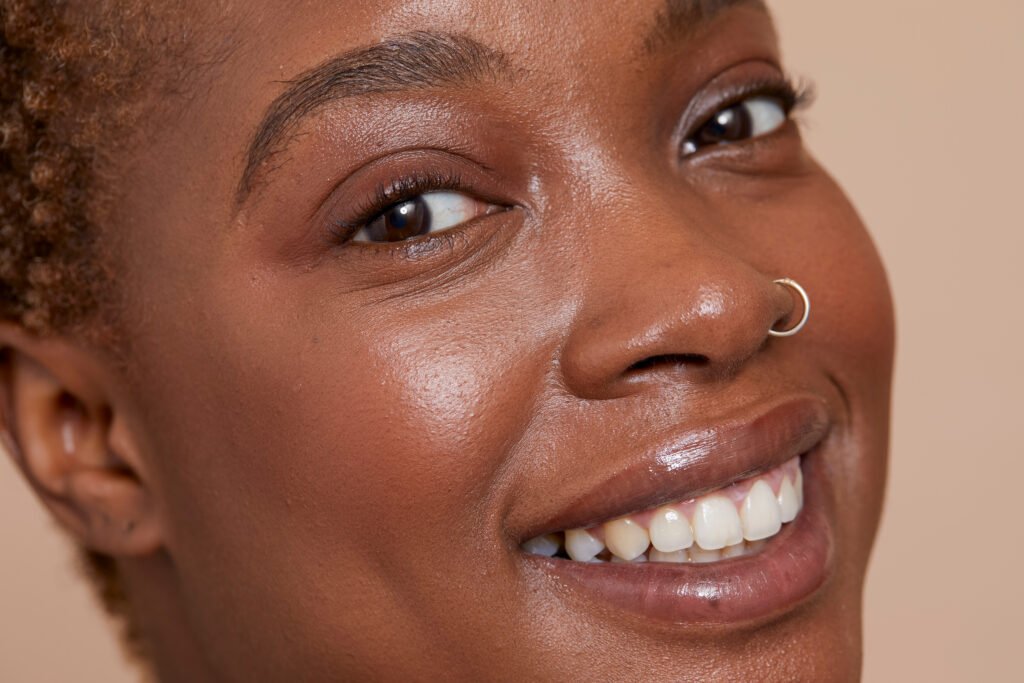 Close-up of a smiling woman reflecting the warmth and emotion found in love quotes