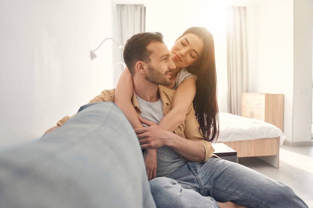 Marriage strengthened through emotional support, comfort, and closeness shared by a couple at home
