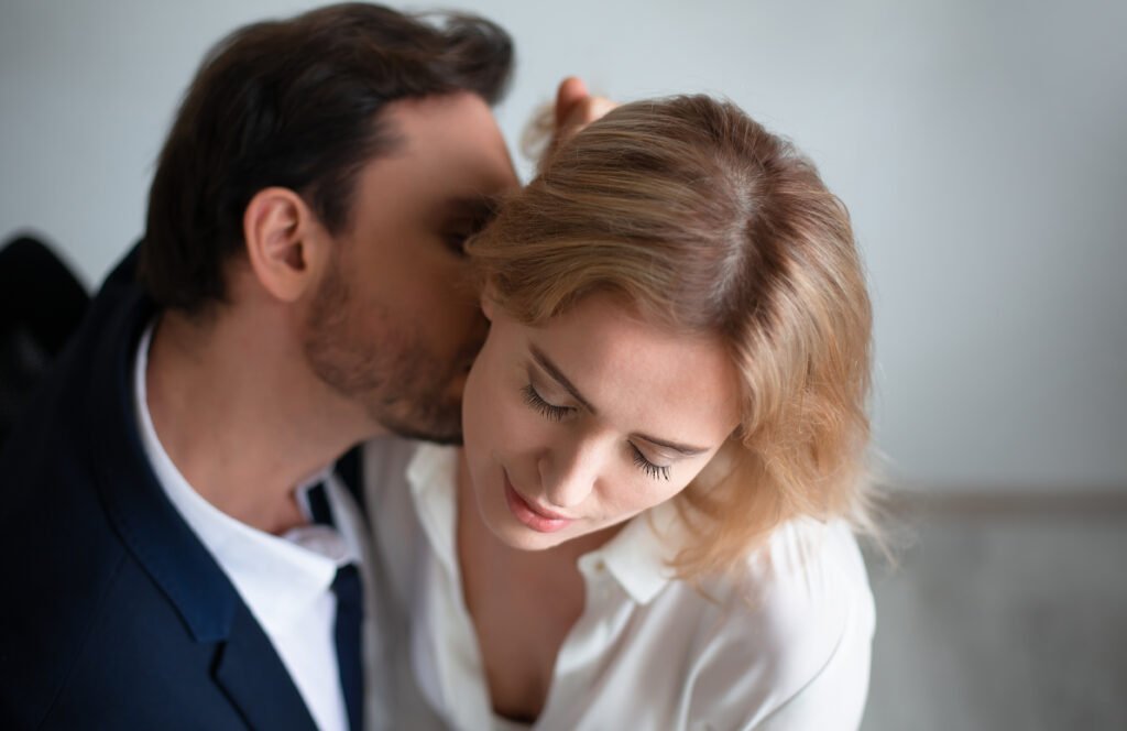 A couple sharing a quiet intimate moment that reflects romance built on emotional closeness rather than grand gestures.