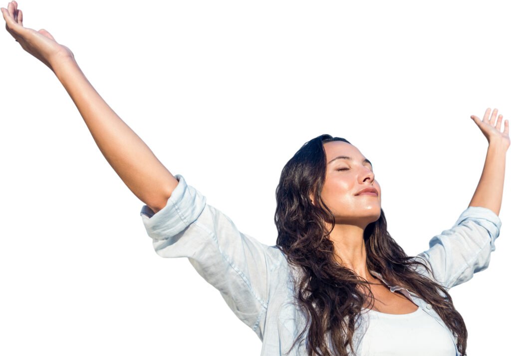 A woman standing with her arms raised and eyes closed, representing emotional relief, acceptance, and moving forward after a difficult dating experience.